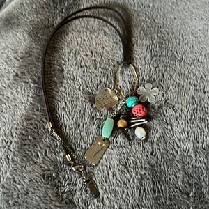 Plunder posse necklace with knotted leather chain